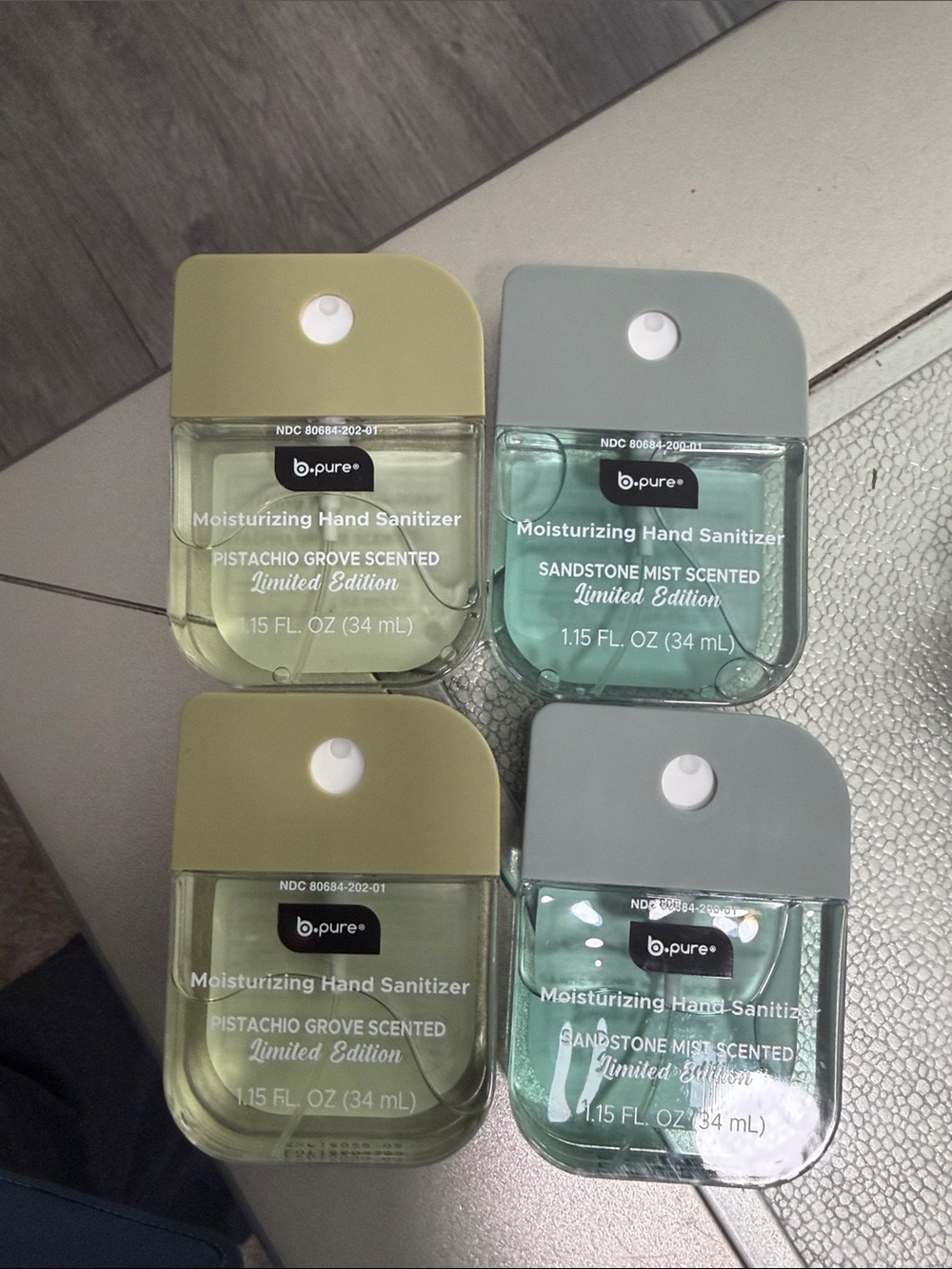 B. Pure moisturizing hand sanitizer. Pistachio and Sandstone mist scents.